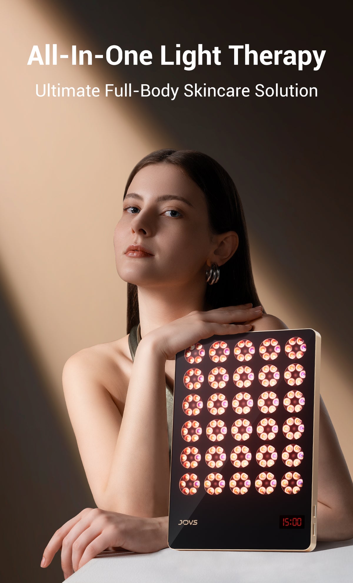 Woman with All-In-One JOVS Light Therapy Device for Comprehensive Skincare.