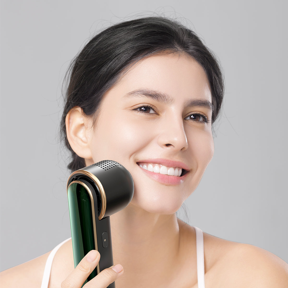 Smiling woman using JOVS Blacken PRO DPL Photorejuvenation Skincare Device for improved skin texture and radiance.