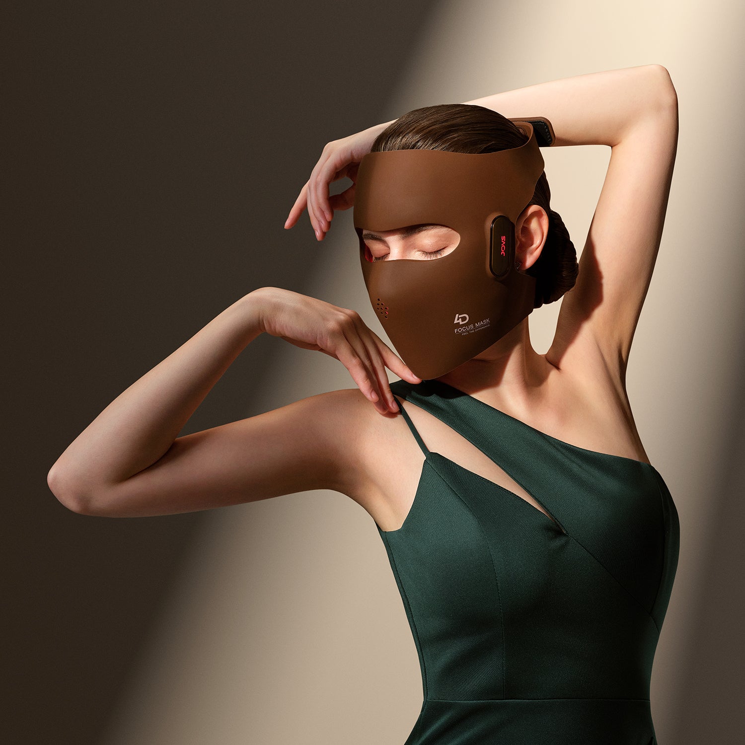 A woman wearing JOVS 4D Laser Light Therapy Mask offering skin solution for collagen stimulation.