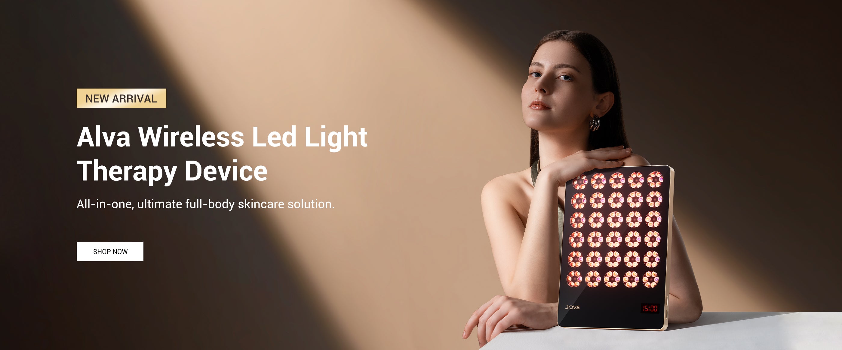 Elegant model presenting the new Alva Wireless LED Light Therapy Device by JOVS, an all-in-one solution for full-body skincare.