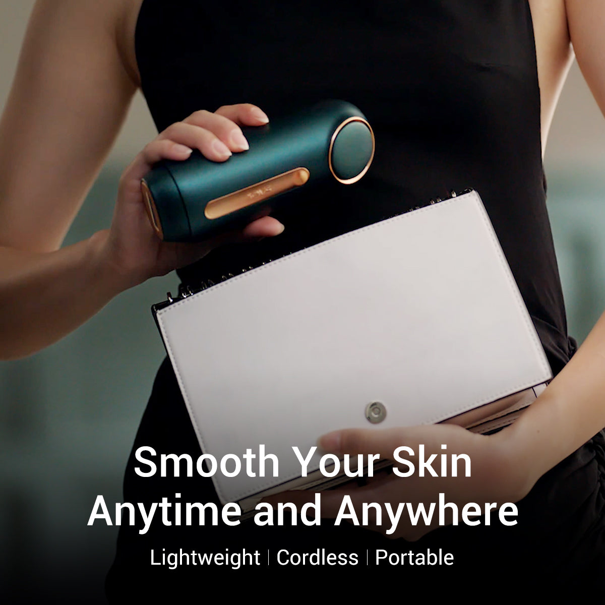 Woman holding a JOVS Mini wireless IPL hair removal device, highlighting its lightweight, cordless, and portable design.