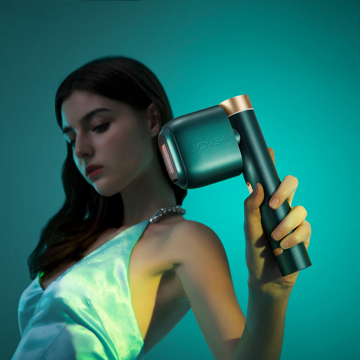 Model gracefully demonstrating the JOVS Venus Pro II hair removal device, showcasing sleek design and effectiveness.